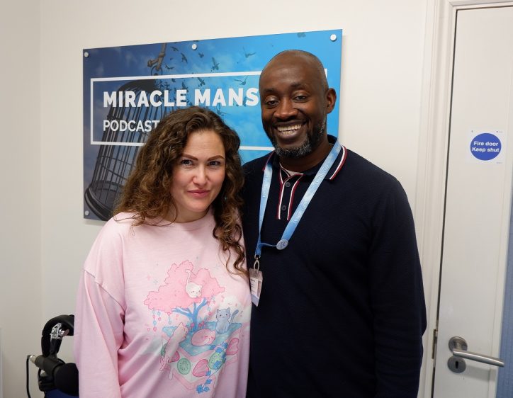 Former client Katie is standing close to Markkus, Head of Treatment and Counselling, and they are both smiling